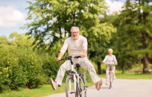 Man riding bike after men's pelvic floor therapy and kegel chair treatment at UROSPOT